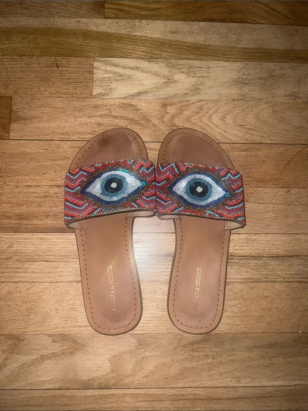 Beaded Eye Slide Sandals in Multicolor and Tan front beading is perfect
